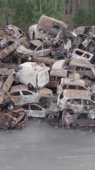 Vertical Video of a Dump of Destroyed Cars During the War in Ukraine