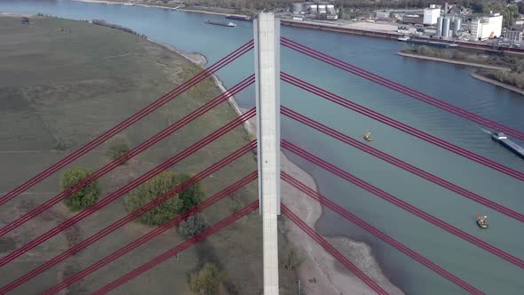 Aerial View of a Cable Stayed Suspension Bridge Crossing a River