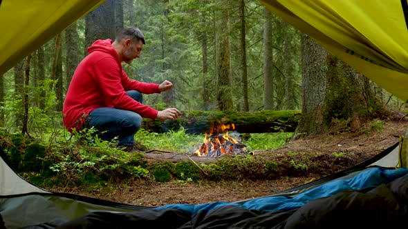 Bearded Man By the Fire in a Beautiful Forest