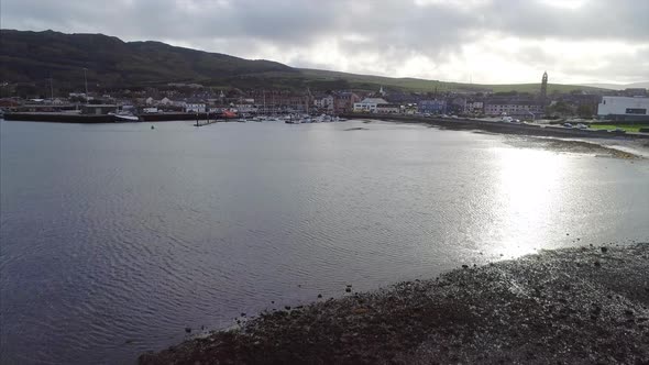 Sunlight reflecting on Campbeltown loch looking towards the village