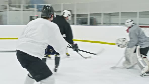 Hockey Players Missing Goalpost