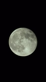 Vertical Video of the Full Moon in the Night Sky