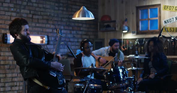 Young Musicians Playing in Garage