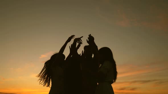 Happy Family Dancing on the Beach. Party By Lake, Children Dancing. Happy Girls Dancing on Beach