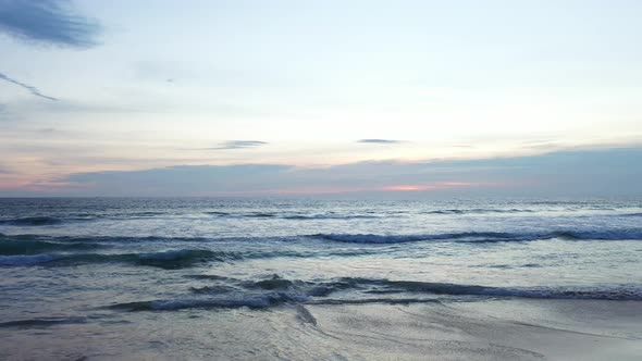 Waves Crashing Along The Beach