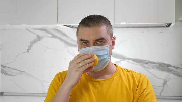 Man Wearing Medical Mask Sniff Lemon