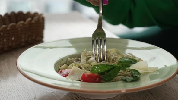 Closeup of Pasta with Pesto Sauce