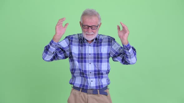 Stressed Senior Bearded Hipster Man Getting Bad News