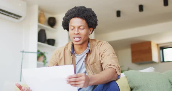 Talking african american man making video call