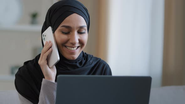 Smiling Arabian Woman Female Muslim Businesswoman in Hijab Freelancer Multitasking Worker Talk on