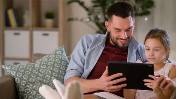 Father and Daughter with Tablet Pc at Home 27