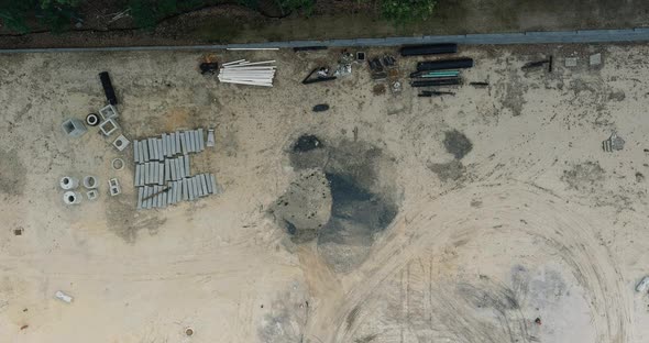 Stacked pipe at concrete drainage pipes for building on a construction site