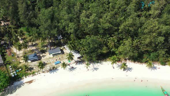 Aerial landscape of paradise bay beach voyage by turquoise ocean with white sandy background of a da