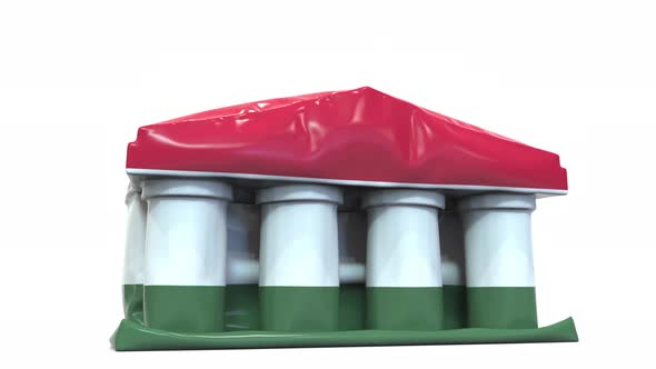 Deflating Bank or Government Building with Flag of Hungary alt