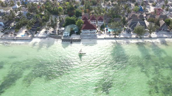 Aerial View of a Boat in the Ocean Near the Coast of Zanzibar Tanzania