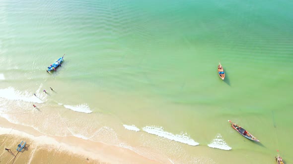 4K aerial view from drone. Fishermen's boats at the beach,