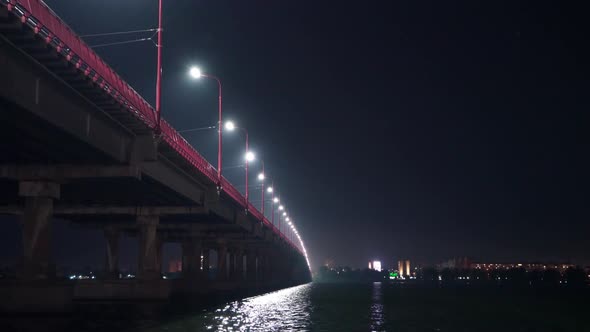 Bottom View of a Beautiful Bright Long Bridge Over the Big Beautiful Dnieper River