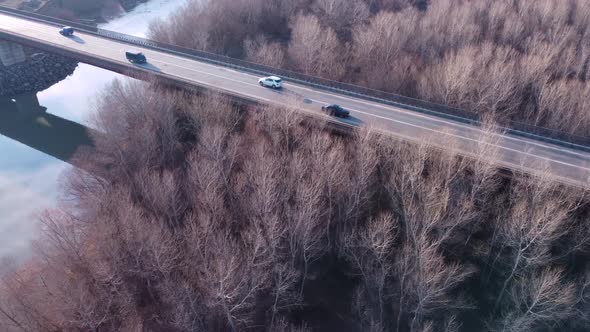 Cars On The Bridge In The Sunny Winter