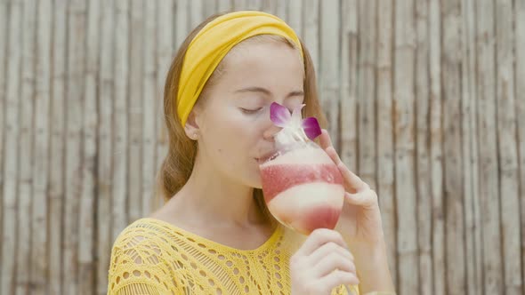 Portrait of Beautiful Woman on Vacation Enjoy Fruitshake