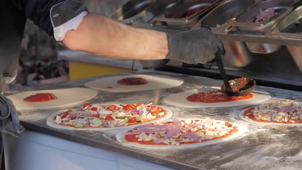 Chef Cooking Italian Neapolita Pizza in Oven with Flame Fire Wood Strove Margarita in Cafe