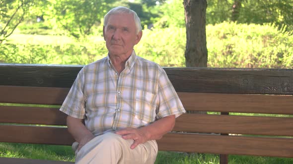 Elderly Man with Phone