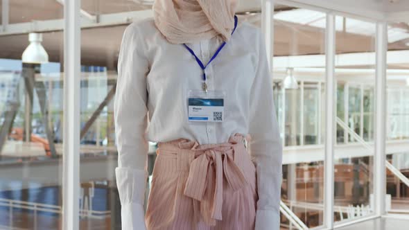 Portrait of a young woman at a business conference