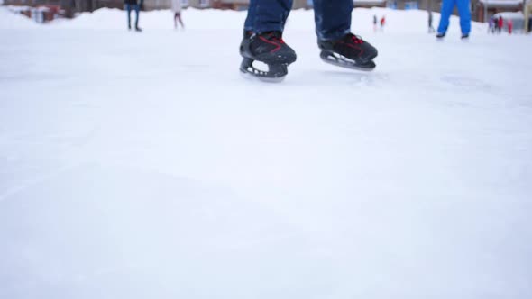 The Blade of the Skates Cuts Through the Ice