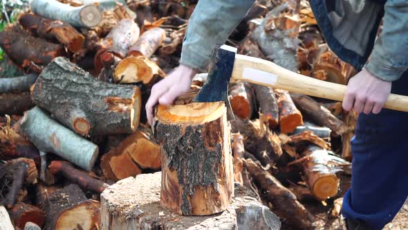 Man Chopping Wood with an Axe