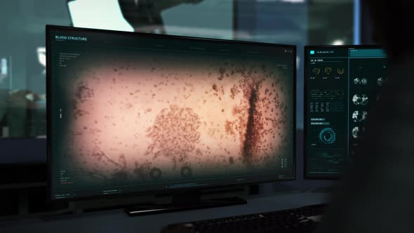 Screen Shows Microscopic Research Software Interface Overseen By Doctor alt