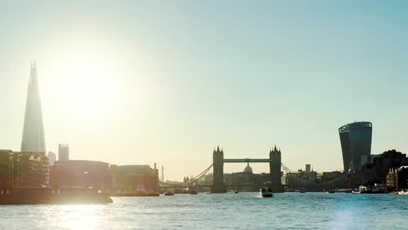 Time-lapse of Tower Bridge at sunset, London, UK. In the background between the towers of Tower Brid