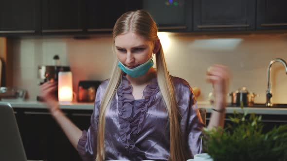 Working at Home: Woman Making Physical Warm Up Activities Sitting at the Computer