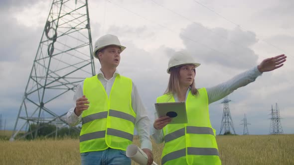 Two Electrical Engineer Working