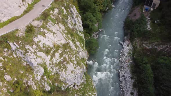 Aerial view from a drone on a road in the mountains.