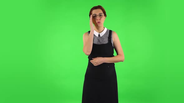 Funny Girl in Round Glasses Is Listens Attentively While Sympathizing. Green Screen