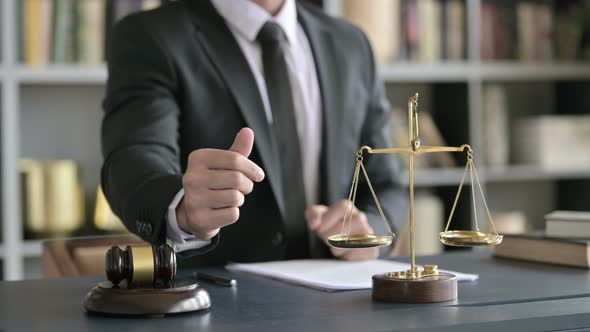 Close Up Shoot of Lawyer Hand Sign for Asking Money in Court Room