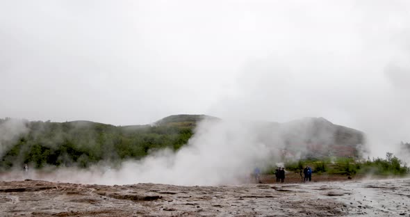 Iceland Geyser in Golden Circle with slow moving steam.