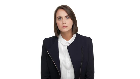 in Slow Motion Portrait of Female Young Adult Being Scary Frightened Wearing Classical Suit Being