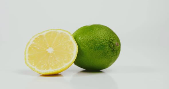 Picture of Lime and Half a Lemon Isolated on White Background