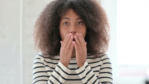 African Woman Reacting to Loss Failure