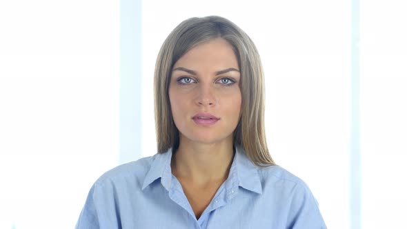 Video Chat at Work by Female worker, Portrait