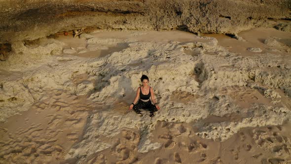 Aerial Drone Flight Over Meditated Girl Bali Indonesia alt