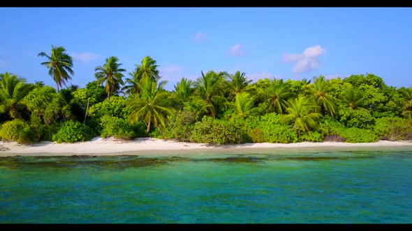 Aerial drone shot scenery of luxury coast beach time by turquoise ocean and white sand background of