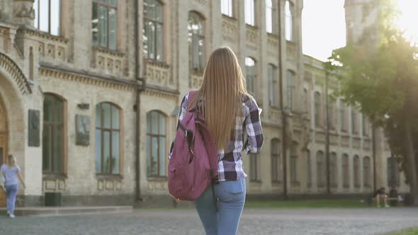 Student Girl Walking Near the University