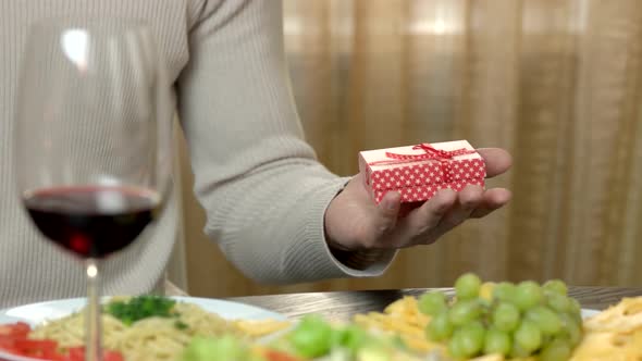 Hands of Couple and Gift