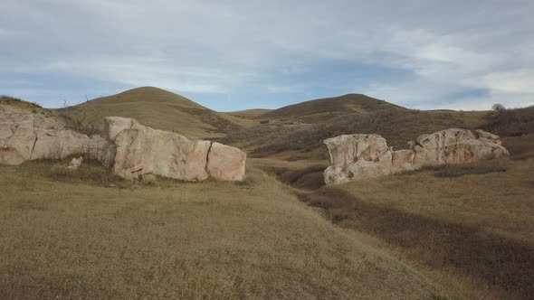 A flight towards a natural rock formation