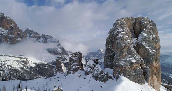 Backward Aerial Through Majestic Cinque Torri Rocky Mounts