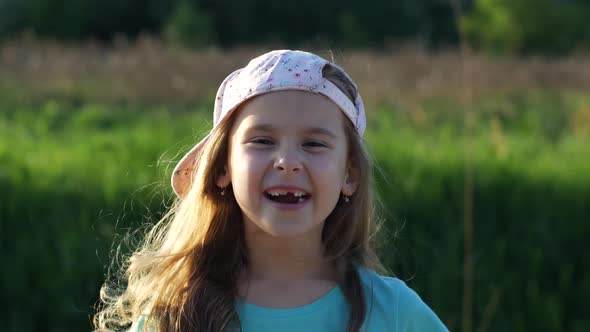 Ridiculous Child Without Tooth Chewing Bubble Gum