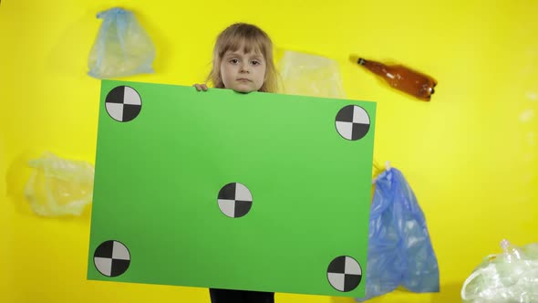 Girl Activist Holding Chroma Key Poster with Tracking Points. Environment Trash Plastic Pollution
