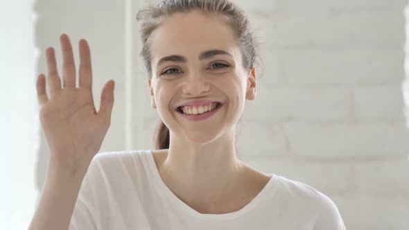 Hello Young Woman Waving Hand to Welcome