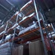 Warehouse with Cardboard Boxes Inside on Pallets Racks Logistic Center - VideoHive Item for Sale